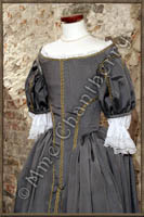 French 
        noble lady dress. Boned bodice and gathered skirt. Golden haberdashery 
        trimmings.